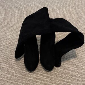 Elegant Black Women's knee high Boots with heel.